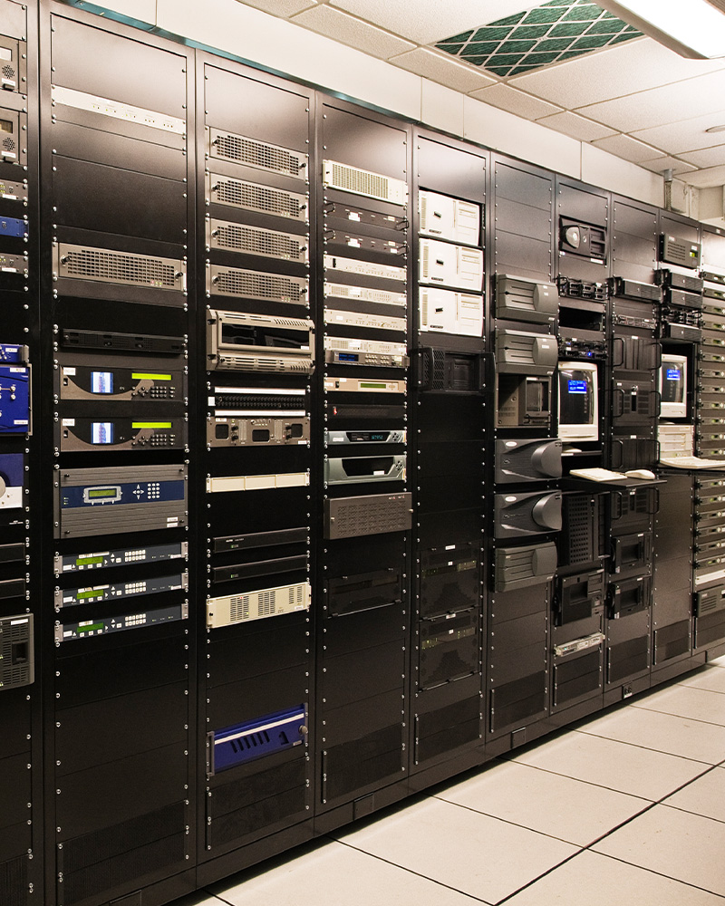 A large room featuring numerous electronic devices installed on the walls, representing a high-tech IT company setting. - Logistix Technologies - outsourced IT services Knoxville